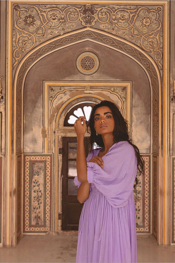 Daughters of India Kyra Maxi Dress in Lilac Gauze — close-up in Jaipur palace archway, hand in hair, billowed sleeve